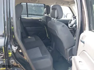 2014 Jeep Patriot Latitude with VIN 1C4NJRFB3ED615996, listed as a IAAI auction lot 41871099 with 120,000 mi miles. Bid and sale history available at carsss.com. Image 8.