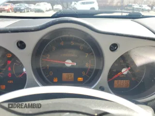 2007 Nissan 350Z Enthusiast z VIN JN1BZ36AX7M651304, wystawiony jako Copart lot #57164945 z przebiegiem 83 332 mil mil oraz Szkoda całkowita • Salvage title. Historia ofert i sprzedaży dostępna na DreamBid. Obrazek 9.