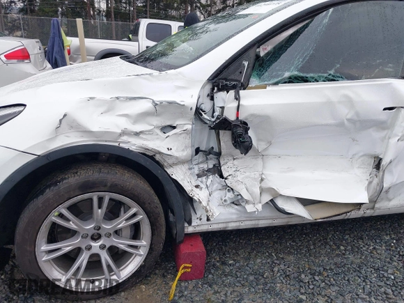 2022 Tesla Model Y Long Range z VIN 7SAYGDEE6NF451259, wystawiony jako IAAI lot #41200775 z przebiegiem 59 683 mil mil oraz . Historia ofert i sprzedaży dostępna na DreamBid. Obrazek 6.
