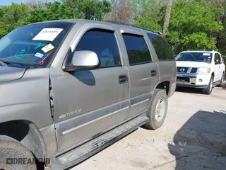 2003 Chevrolet Tahoe LS with VIN 1GNEC13V43J308143, listed as a IAAI auction lot 42015589 with 280,289 mi miles. Bid and sale history available at carsss.com. Image 12.