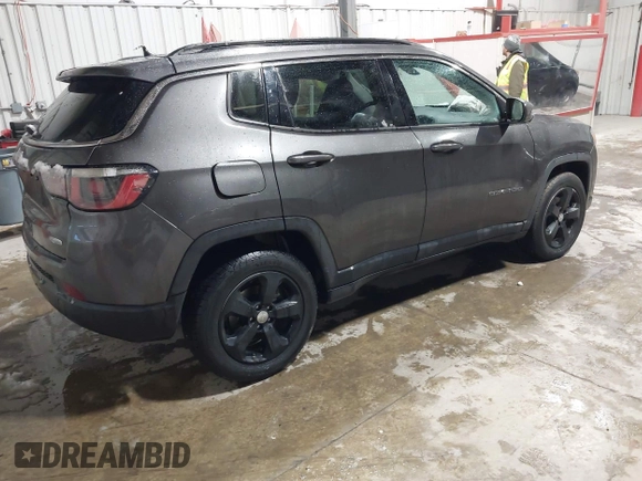 2018 Jeep Compass Latitude with VIN 3C4NJCBB0JT462114, listed as a IAAI auction lot 41567773 with 62,216 mi miles and . Bid and sale history available at DreamBid. Image 4.
