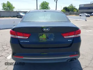 2016 Kia Optima LX Turbo with VIN 5XXGT4L12GG077169, listed as a IAAI auction lot 42108788 with 116,589 mi miles. Bid and sale history available at carsss.com. Image 16.