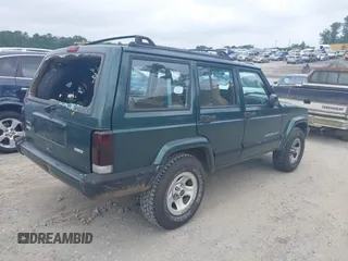 2000 Jeep Cherokee z VIN 1J4FT48S4YL265734, wystawiony jako IAAI lot #42556994 z przebiegiem 228 162 mil mil oraz . Historia ofert i sprzedaży dostępna na DreamBid. Obrazek 4.