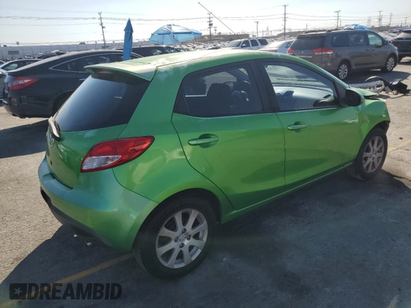 2011 Mazda 2 Touring z VIN JM1DE1HZ4B0115764, wystawiony jako Copart lot #56161455 z przebiegiem 134 274 mil mil oraz Szkoda całkowita • Salvage title. Historia ofert i sprzedaży dostępna na DreamBid. Obrazek 3.