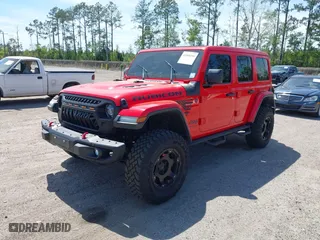 2020 Jeep Wrangler Unlimited Rubicon with VIN 1C4HJXFG9LW106607, listed as a IAAI auction lot 41908295 with 71,083 mi miles. Bid and sale history available at carsss.com. Image 17.