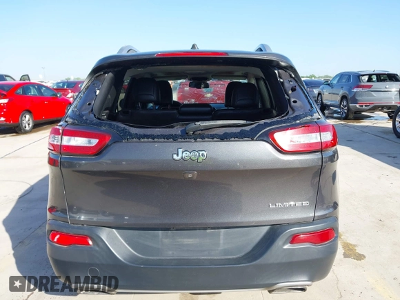 2016 Jeep Cherokee Limited with VIN 1C4PJLDS7GW159825, listed as a IAAI auction lot 41951609 with 102,624 mi miles and . Bid and sale history available at DreamBid. Image 16.