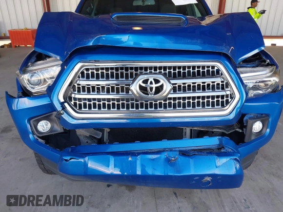 2017 Toyota Tacoma SR5 with VIN 3TMBZ5DN1HM009204, listed as a IAAI auction lot 41301765 with 129,923 mi miles and . Bid and sale history available at DreamBid. Image 6.