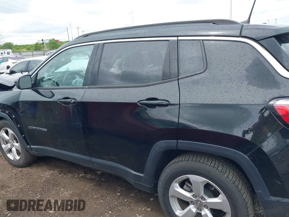 2017 Jeep Compass Latitude with VIN 3C4NJCBB3HT653021, listed as a IAAI auction lot 42263281 with 91,076 mi miles and . Bid and sale history available at DreamBid. Image 14.