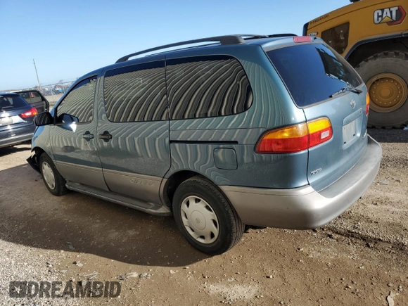 2000 Toyota Sienna CE with VIN 4T3ZF19C1YU285114, listed as a Copart auction lot 87158574 with 267,168 mi miles and Salvage Title. Bid and sale history available at carsss.com. Image 2.