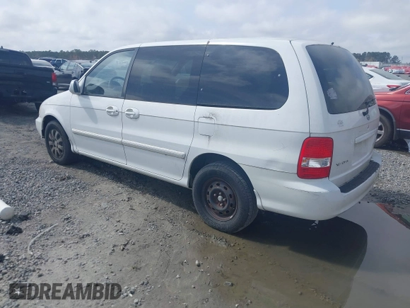 2005 Kia Sedona LX with VIN KNDUP132856700868, listed as a IAAI auction lot 41661428 with 229,142 mi miles. Bid and sale history available at carsss.com. Image 3.
