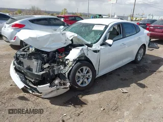 2016 Kia Optima LX z VIN KNAGT4L30G5095415, wystawiony jako IAAI lot #41964937 z przebiegiem 67 303 mil mil oraz . Historia ofert i sprzedaży dostępna na DreamBid. Obrazek 2.