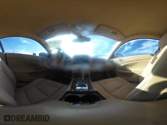 2008 Jaguar XK with VIN SAJWA43C089B22700, listed as a IAAI auction lot 41585734 with 67,946 mi miles. Bid and sale history available at carsss.com. Image 19.