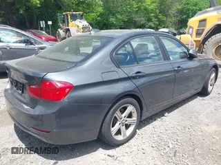 2014 BMW 3 Series 320i xDrive with VIN WBA3C3C57EP662795, listed as a IAAI auction lot 42267683 with 153,451 mi miles and . Bid and sale history available at DreamBid. Image 4.
