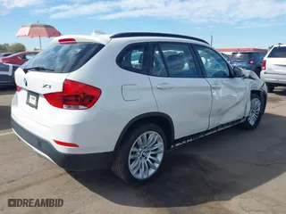 2014 BMW X1 sDrive28i with VIN WBAVM1C52EVW52505, listed as a IAAI auction lot 41625122 with 44,684 mi miles. Bid and sale history available at carsss.com. Image 4.