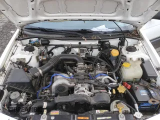 1996 Subaru Legacy Outback with VIN 4S3BG6850T7971454, listed as a Copart auction lot 52082395 with 173,542 mi miles and Salvage title. Bid and sale history available at DreamBid. Image 11.
