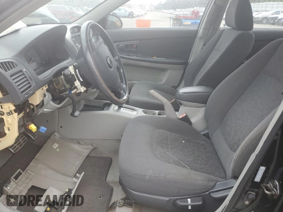 2005 Kia Spectra LX z VIN KNAFE121155165277, wystawiony jako Copart lot #55357155 z przebiegiem Nie podano mil oraz Czysty tytuł • Clean title. Historia ofert i sprzedaży dostępna na DreamBid. Obrazek 7.