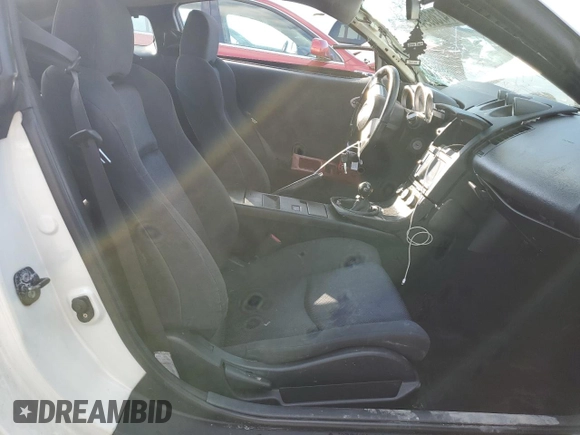 2004 Nissan 350Z Enthusiast with VIN JN1AZ34D84M104374, listed as a Copart auction lot 74736994 with 116,098 mi miles and Salvage Title. Bid and sale history available at DreamBid. Image 7.