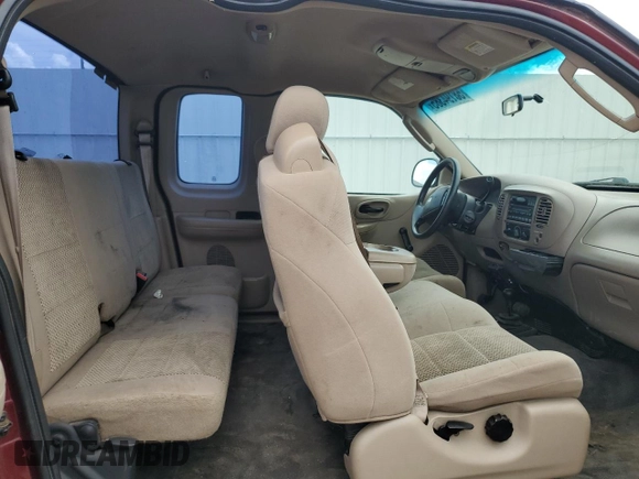 2003 Ford F-150 XL z VIN 2FTPX18LX3CA36886, wystawiony jako Copart lot #58194385 z przebiegiem 302 328 mil mil oraz Czysty tytuł • Clean title. Historia ofert i sprzedaży dostępna na DreamBid. Obrazek 10.
