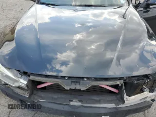 2013 BMW 3 Series 328i xDrive z VIN WBA3B5C51DF593458, wystawiony jako Copart lot #64755635 z przebiegiem 88 820 mil mil oraz Szkoda całkowita • Salvage title. Historia ofert i sprzedaży dostępna na DreamBid. Obrazek 11.