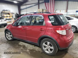 2012 Suzuki SX4 Crossover with VIN JS2YB5A38C6301805, listed as a Copart auction lot 82834774 with 141,858 mi miles and Salvage Title. Bid and sale history available at carsss.com. Image 2.