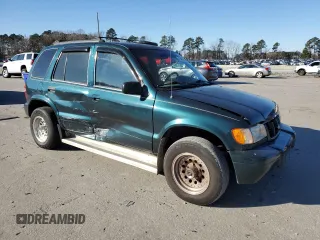 2001 Kia Sportage with VIN KNDJB723115705926, listed as a Copart auction lot 41489735 with 155,820 mi miles and Salvage Title. Bid and sale history available at carsss.com. Image 4.