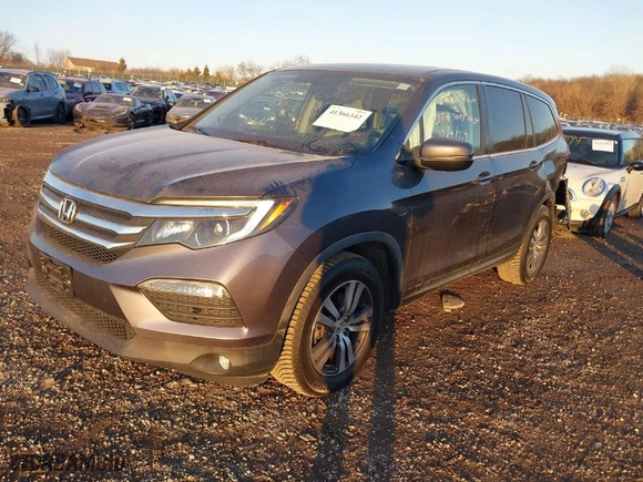 2017 Honda Pilot EX-L with VIN 5FNYF5H56HB020703, listed as a IAAI auction lot 41366342 with 96,618 mi miles. Bid and sale history available at carsss.com. Image 2.