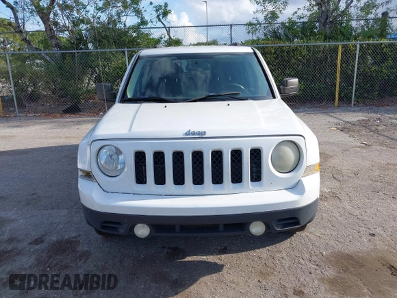 2014 Jeep Patriot Sport with VIN 1C4NJPBBXED671220, listed as a IAAI auction lot 42163245 with 216,848 mi miles. Bid and sale history available at carsss.com. Image 6.