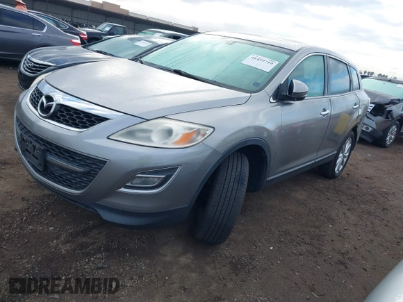 2011 Mazda CX-9 Grand Touring with VIN JM3TB2DV4B0311112, listed as a IAAI auction lot 41459719 with 135,457 mi miles. Bid and sale history available at carsss.com. Image 2.