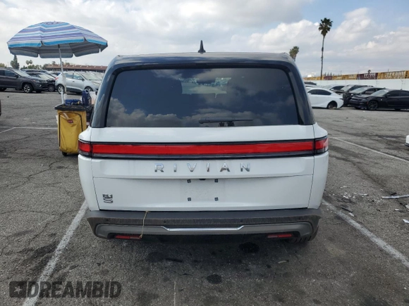 2025 Rivian R1S Adventure z VIN 7PDSGBBA1SN051768, wystawiony jako Copart lot #43838115 z przebiegiem 4875 mil mil oraz Szkoda całkowita • Salvage title. Historia ofert i sprzedaży dostępna na DreamBid. Obrazek 6.