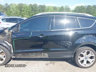 2017 Ford Escape Titanium with VIN 1FMCU0J91HUA75417, listed as a IAAI auction lot 42044170 with 116,431 mi miles. Bid and sale history available at carsss.com. Image 15.