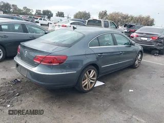 2013 Volkswagen CC Lux with VIN WVWRP7AN8DE507811, listed as a IAAI auction lot 41447468 with 147,162 mi miles. Bid and sale history available at carsss.com. Image 4.