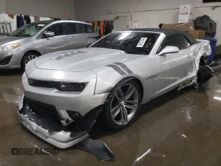 2014 Chevrolet Camaro LT z VIN 2G1FC3D31E9310610, wystawiony jako Copart lot #84157344 z przebiegiem 76 497 mil mil oraz Szkoda całkowita • Salvage title. Historia ofert i sprzedaży dostępna na DreamBid. Obrazek 1.