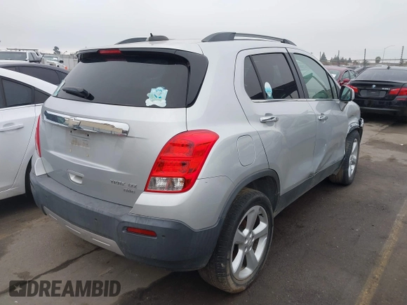 2015 Chevrolet Trax LTZ with VIN 3GNCJTSB7FL235895, listed as a IAAI auction lot 41279161 with 158,877 mi miles. Bid and sale history available at carsss.com. Image 4.