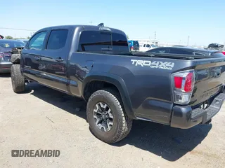 2023 Toyota Tacoma SR5 z VIN 3TMDZ5BN6PM153633, wystawiony jako IAAI lot #42353187 z przebiegiem 50 020 mil mil oraz . Historia ofert i sprzedaży dostępna na DreamBid. Obrazek 3.