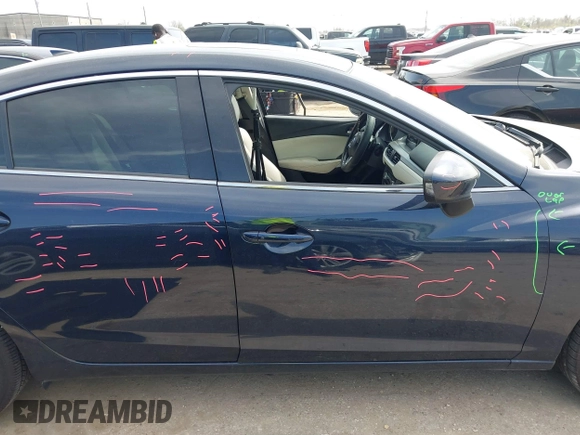 2016 Mazda 6 i Grand Touring with VIN JM1GJ1W59G1439075, listed as a IAAI auction lot 41792755 with 99,215 mi miles and . Bid and sale history available at DreamBid. Image 13.