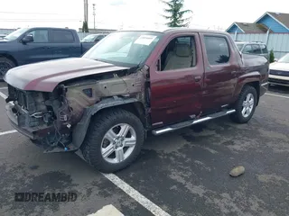 2009 Honda Ridgeline RTL with VIN 5FPYK16539B101836, listed as a IAAI auction lot 41894409 with 185,325 mi miles. Bid and sale history available at carsss.com. Image 2.
