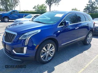 2023 Cadillac XT5 FWD Premium Luxury z VIN 1GYKNCRS3PZ176654, wystawiony jako IAAI lot #42136259 z przebiegiem 20 403 mil mil oraz . Historia ofert i sprzedaży dostępna na DreamBid. Obrazek 18.