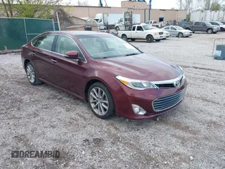 2015 Toyota Avalon Limited with VIN 4T1BK1EB9FU177047, listed as a IAAI auction lot 41971667 with 100,811 mi miles and . Bid and sale history available at carsss.com. Image 1.