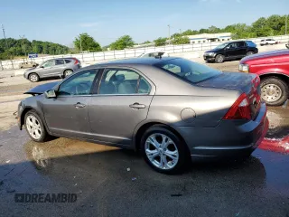 2012 Ford Fusion SE z VIN 3FAHP0HA0CR437115, wystawiony jako Copart lot #56583495 z przebiegiem 159 649 mil mil oraz Szkoda całkowita • Salvage title. Historia ofert i sprzedaży dostępna na DreamBid. Obrazek 2.