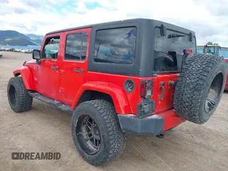 2018 Jeep Wrangler JK Unlimited Sahara with VIN 1C4HJWEG3JL893970, listed as a IAAI auction lot 39530074 with 72,079 mi miles. Bid and sale history available at carsss.com. Image 3.