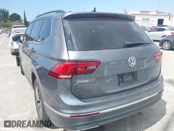 2020 Volkswagen Tiguan SE with VIN 3VV3B7AX9LM061569, listed as a IAAI auction lot 41902252 with 33,079 mi miles and . Bid and sale history available at DreamBid. Image 3.