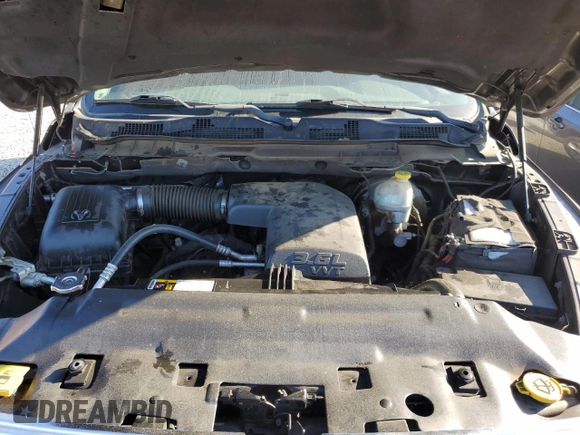 2014 Ram 1500 Big Horn z VIN 1C6RR7LG2ES310426, wystawiony jako Copart lot #50493515 z przebiegiem 200 187 mil mil oraz Szkoda całkowita • Salvage title. Historia ofert i sprzedaży dostępna na DreamBid. Obrazek 11.