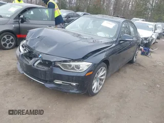 2013 BMW 3 Series 335i xDrive with VIN WBA3B9C50DJ899068, listed as a IAAI auction lot 41331622 with 156,216 mi miles. Bid and sale history available at carsss.com. Image 2.