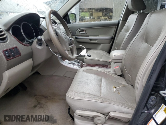 2006 Suzuki Grand Vitara Luxury with VIN JS3TD947364101307, listed as a Copart auction lot 55037585 with 198,616 mi miles and Salvage title. Bid and sale history available at DreamBid. Image 7.