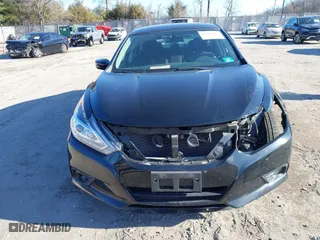 2018 Nissan Altima 2.5 SV with VIN 1N4AL3AP5JC265091, listed as a IAAI auction lot 41293465 with 102,343 mi miles. Bid and sale history available at carsss.com. Image 12.
