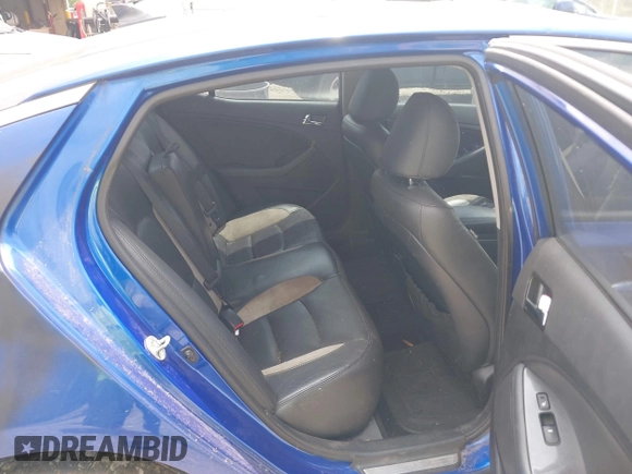 2013 Kia Optima SX with VIN 5XXGR4A68DG122057, listed as a IAAI auction lot 42421160 with 219,965 mi miles and . Bid and sale history available at DreamBid. Image 8.