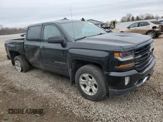 2018 Chevrolet Silverado 1500 LT with VIN 3GCUKREC6JG318026, listed as a Copart auction lot 50734205 with 73,364 mi miles and Salvage Title. Bid and sale history available at carsss.com. Image 4.