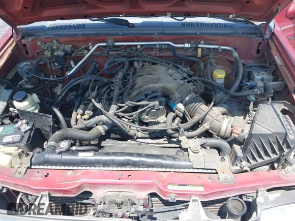2000 Nissan Frontier XE z VIN 1N6ED27Y3YC382842, wystawiony jako IAAI lot #42343459 z przebiegiem 172 454 mil mil oraz . Historia ofert i sprzedaży dostępna na DreamBid. Obrazek 10.