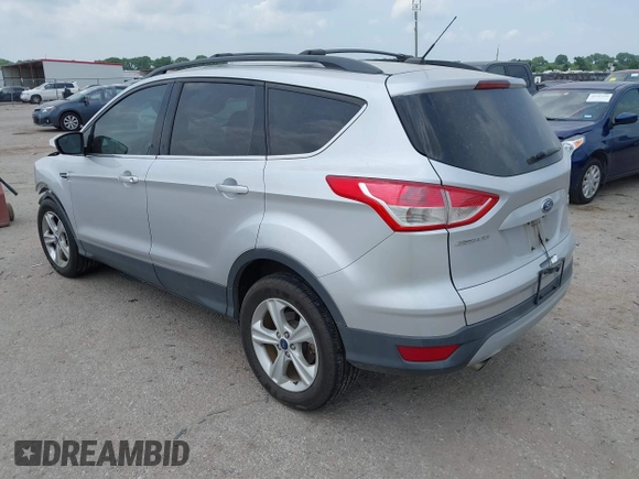 2013 Ford Escape SE with VIN 1FMCU0GX9DUD68711, listed as a IAAI auction lot 42243521 with 120,441 mi miles and . Bid and sale history available at DreamBid. Image 3.