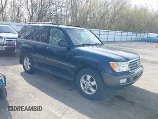 2004 Toyota Land Cruiser with VIN JTEHT05J942054673, listed as a IAAI auction lot 42112791 with 206,784 mi miles. Bid and sale history available at carsss.com. Image 1.